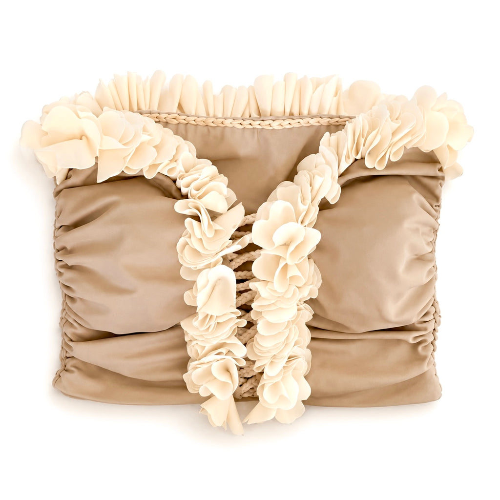 Tan and cream floral tube top with flower lei trim and hand-crocheted, open lace-up center detail.