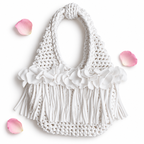 Handmade Gardenia white crochet mini bag with sculptural floral trim, flowing fringe and a braided handle.