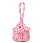 Handmade crochet mini swing bag in Petal pink with flower fringe and a loop-through wristlet handle. 
