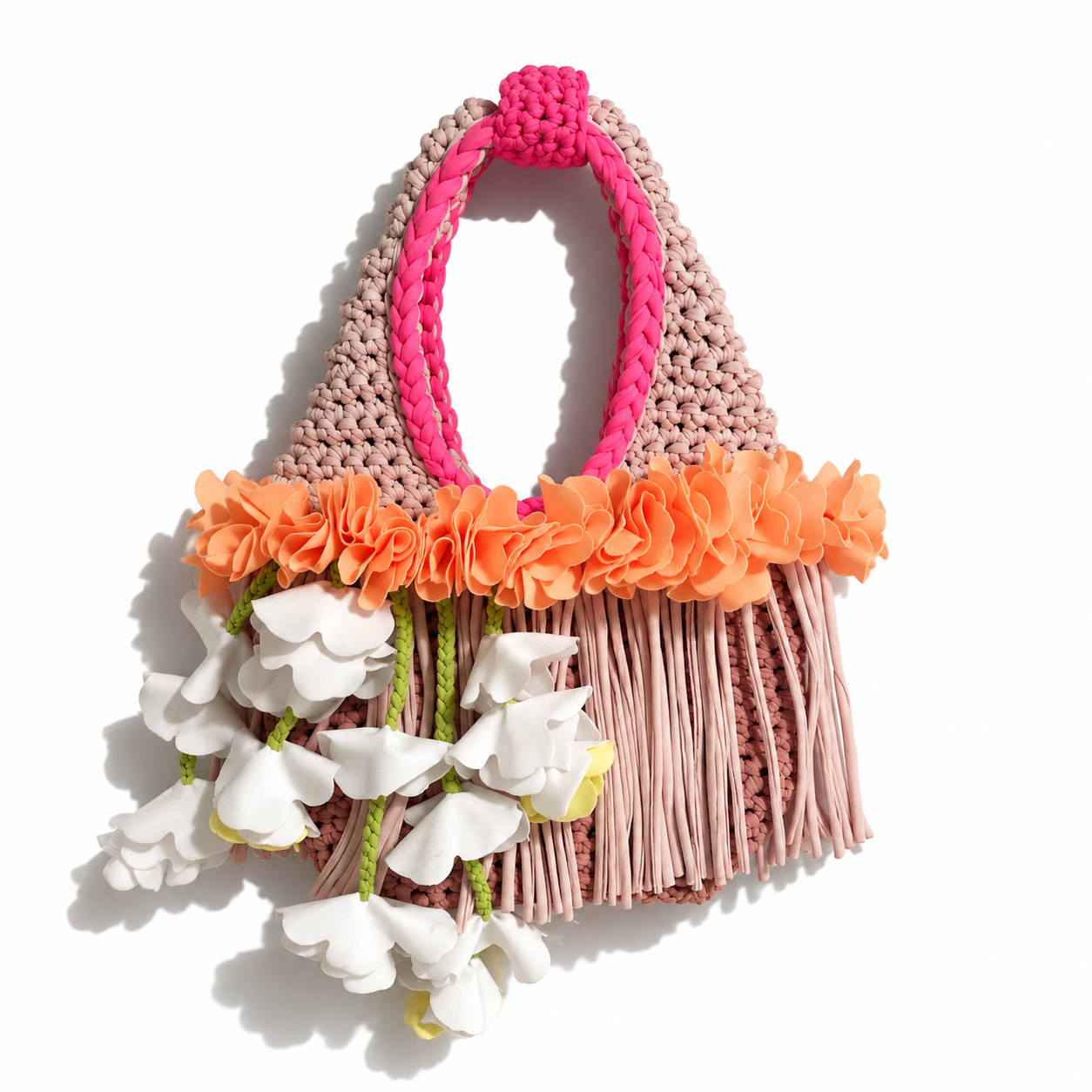 Handmade neural tan crochet whimsy mini bag with cascading orange floral fringe and braided white petal bells.