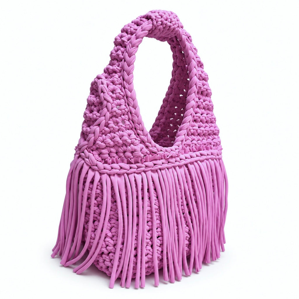 Handmade Orchid pink purple crochet fringe mini bag with flowing fringe and a braided handle.