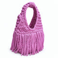 Handmade Orchid pink purple crochet fringe mini bag with flowing fringe and a braided handle.