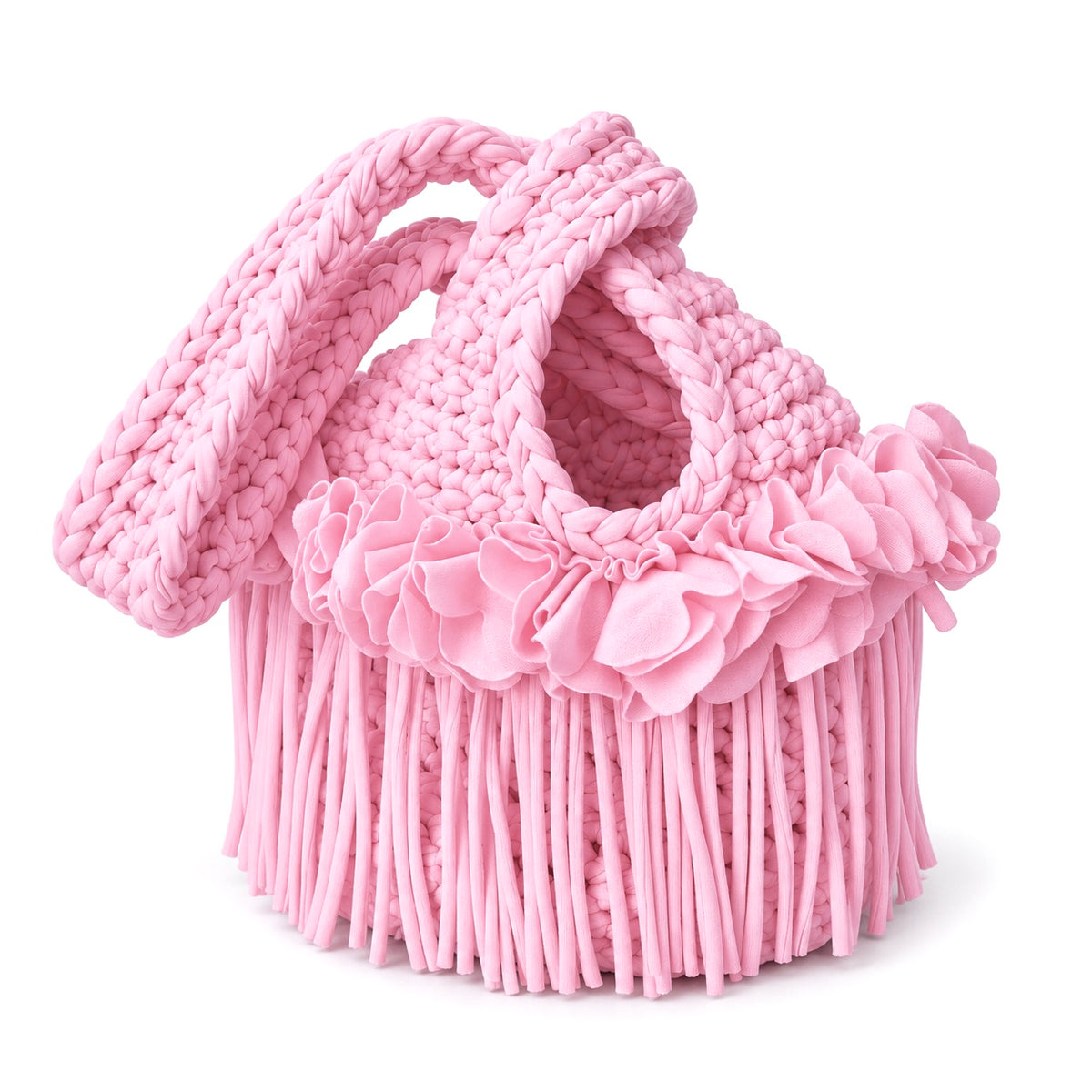 Handmade crochet mini swing bag in Petal pink with flower fringe and a loop-through wristlet handle.