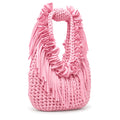 Petal pink hand-crocheted Flower Lei Mini bag with cascading floral ruffles and fringe, featuring a braided handle and sculptural mini silhouette.