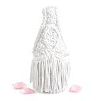 Handmade Gardenia white crochet fringe mini bag with flowing fringe and a braided handle.