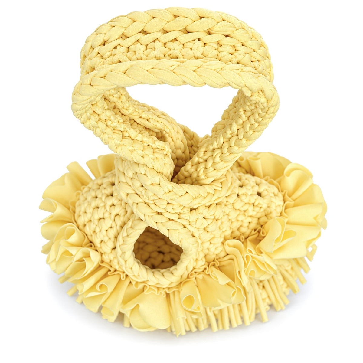 Handmade crochet mini swing bag in Daffodil light yellow with flower fringe and a loop-through wristlet handle.
