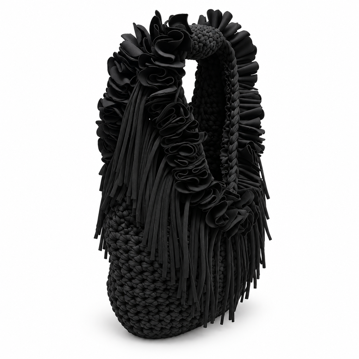 Onyx black hand-crocheted Flower Lei Mini bag with cascading floral ruffles and fringe, featuring a braided handle and sculptural mini silhouette.