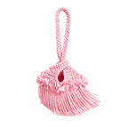 Handmade crochet mini swing bag in Petal pink with flower fringe and a loop-through wristlet handle. 