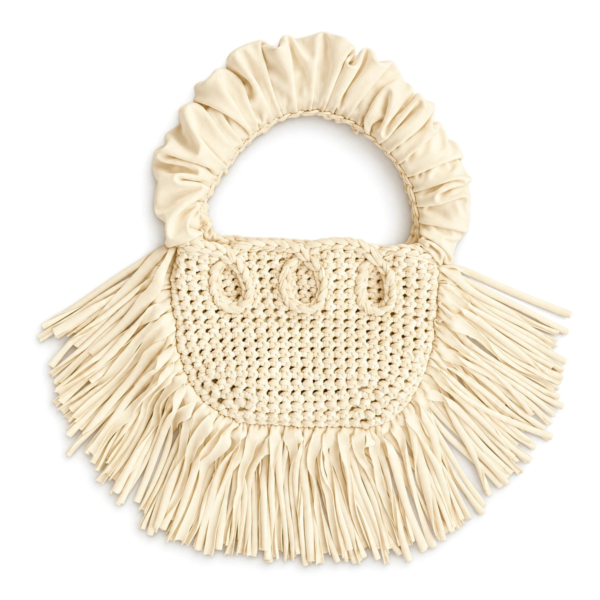 Magnolia cream handmade crochet Cha Cha Mini bag featuring a crescent-shaped body, braided loop detailing, ruched scrunchie handle and flowing fringe. 