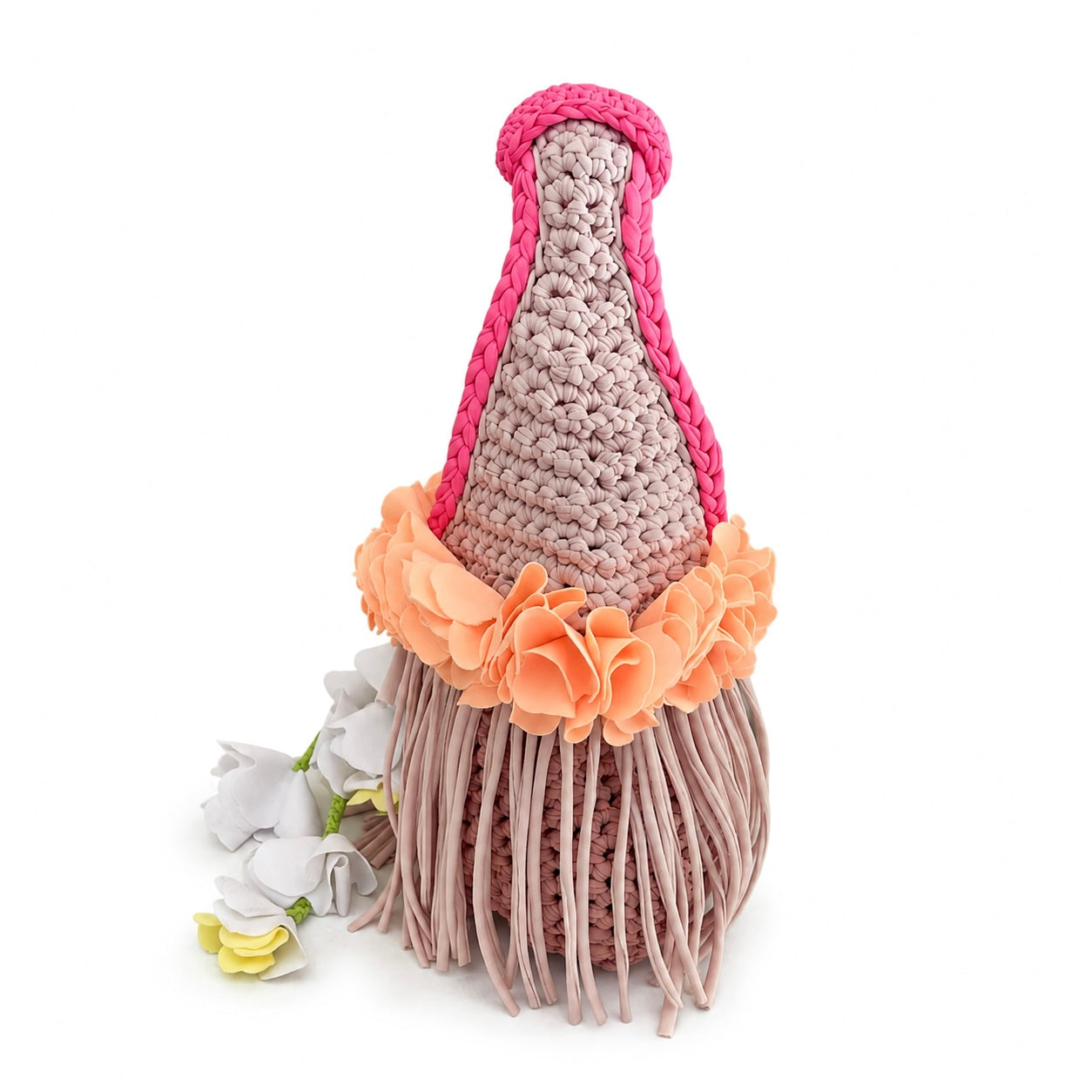 Handmade neural tan crochet whimsy mini bag with cascading orange floral fringe and braided white petal bells.