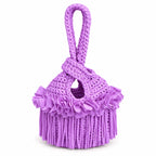 Handmade crochet mini swing bag in Orchid pink purple with flower fringe and a loop-through wristlet handle.