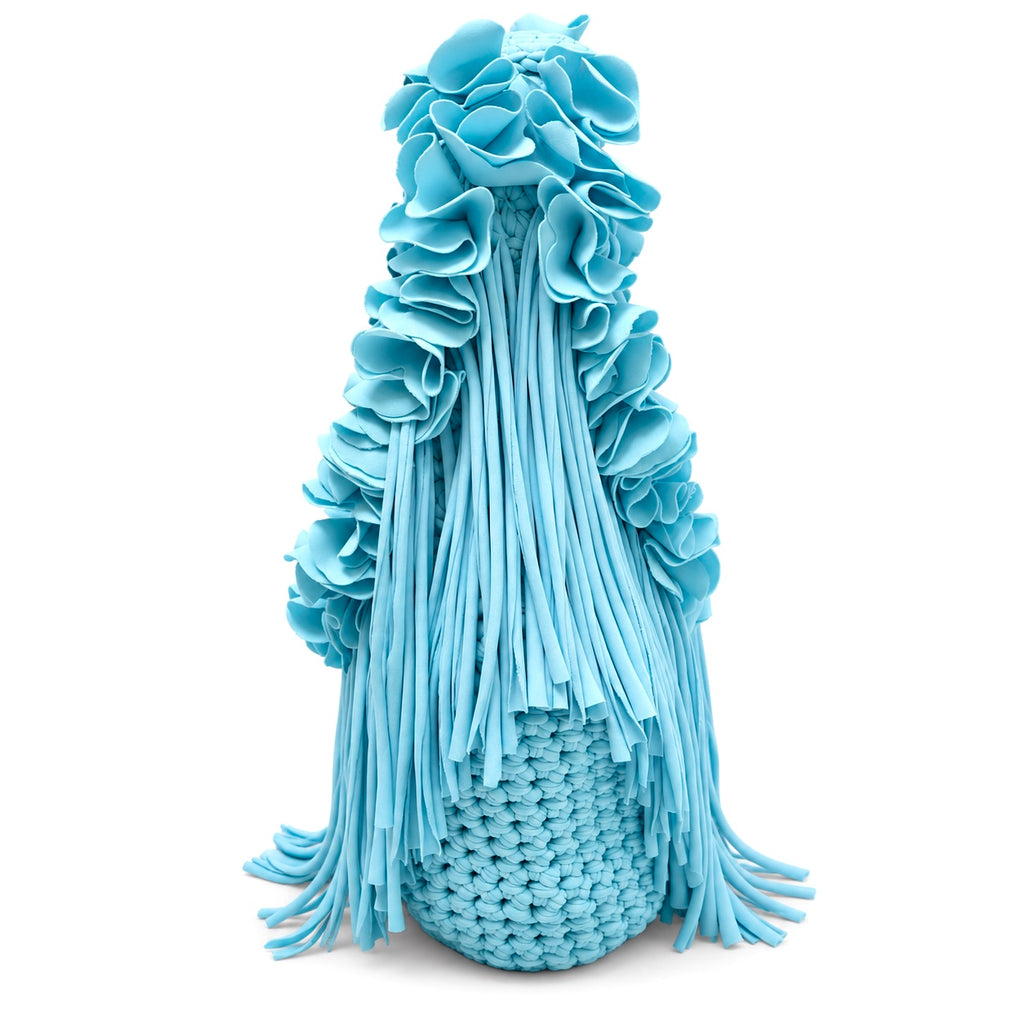 Hydrangea light blue hand-crocheted Flower Lei Mini bag with cascading floral ruffles and fringe, featuring a braided handle and sculptural mini silhouette.