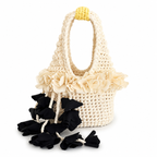 Handmade magnolia cream and onyx black crochet petal bell floral mini bag