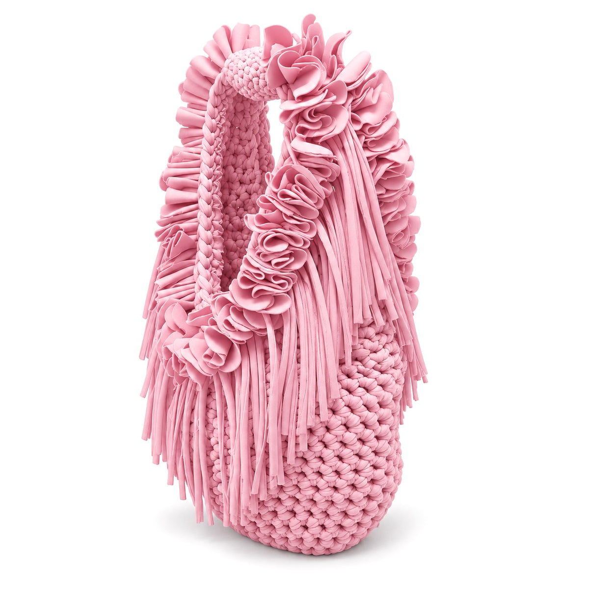 Petal pink hand-crocheted Flower Lei Mini bag with cascading floral ruffles and fringe, featuring a braided handle and sculptural mini silhouette.