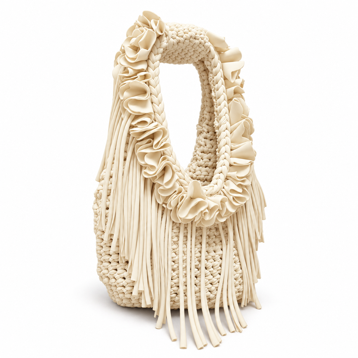 Magnolia cream hand-crocheted Flower Lei Mini bag with cascading floral ruffles and fringe, featuring a braided handle and sculptural mini silhouette.