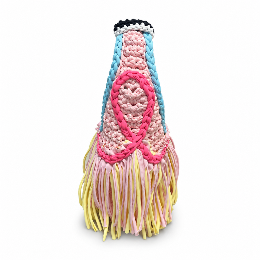 Handmade crochet fringe mini bag in Petal pink with Hydrangea blue, Hibiscus pink and Daffodil yellow details and flowing fringe.