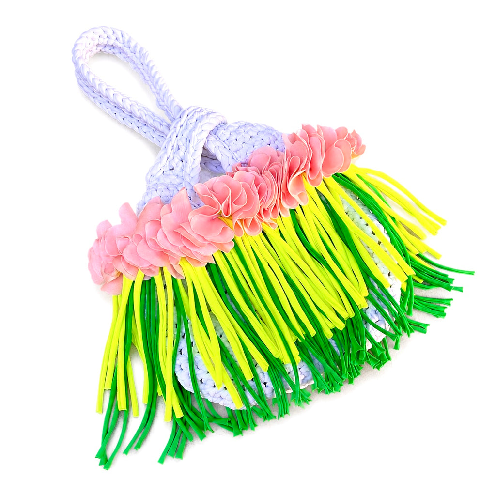 Handmade crochet mini swing bag in Gardenia white with pink flowers and tennis green fringe, featuring a loop-through wristlet by Daisy C. 