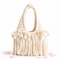 Crochet Magnolia cream flower fringe mini bag, handmade with stretch nylon/spandex. 