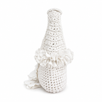 Handmade crochet petal bell mini bag in gardenia white, with braided handle and cascading petal trim. 