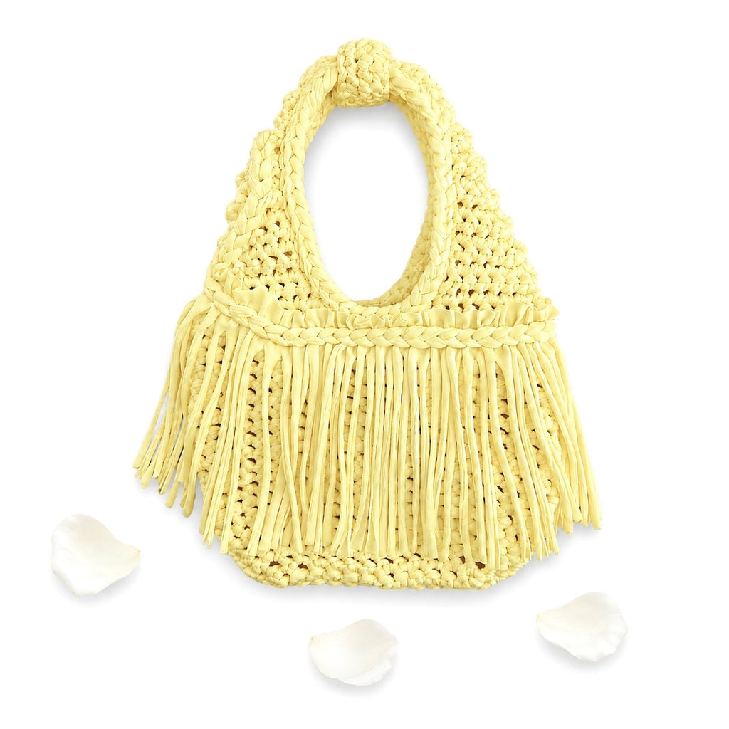 Handmade Daffodil light yellow crochet fringe mini bag made with stretch nylon/spandex. 