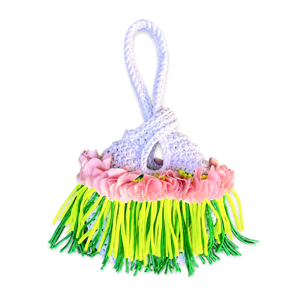 Handmade crochet mini swing bag in Gardenia white with pink flowers and tennis green fringe, featuring a loop-through wristlet by Daisy C. 