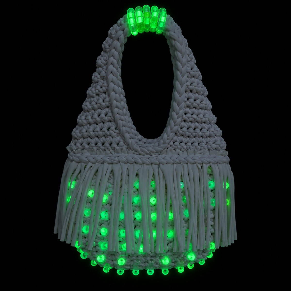 Gardenia white handmade crochet fringe mini bag with UV-reactive glow-in-the-dark beads transforms into fluorescent glowing green tones at night. 