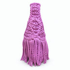 Handmade Orchid pink purple crochet fringe mini bag with flowing fringe and a braided handle.