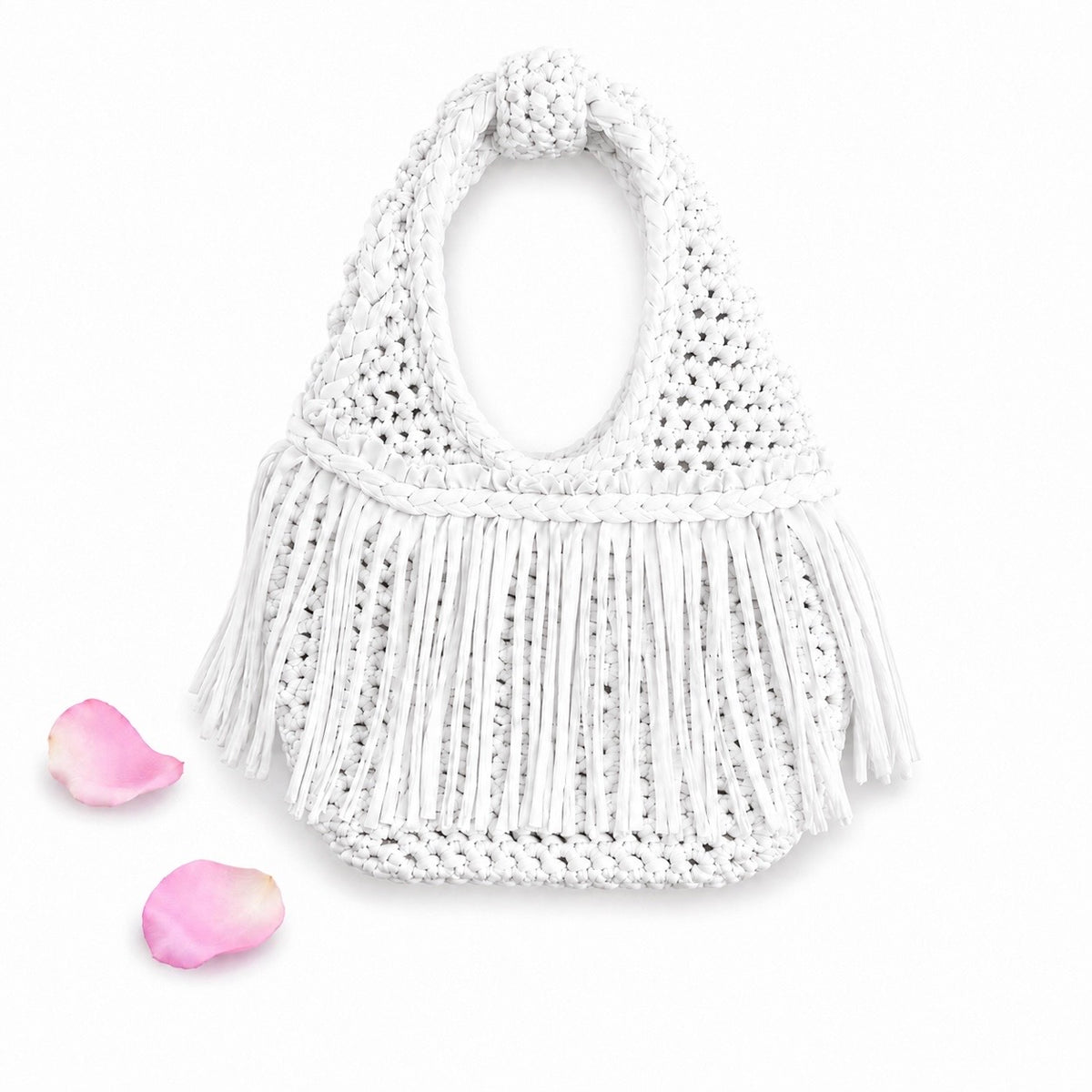 Handmade Gardenia white crochet fringe mini bag with flowing fringe and a braided handle.