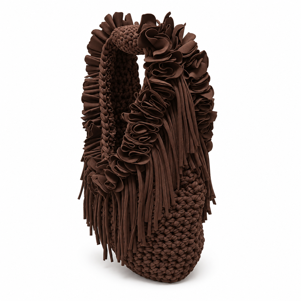 Coconut Shell brown hand-crocheted Flower Lei Mini bag with cascading floral ruffles and fringe, featuring a braided handle and sculptural mini silhouette.