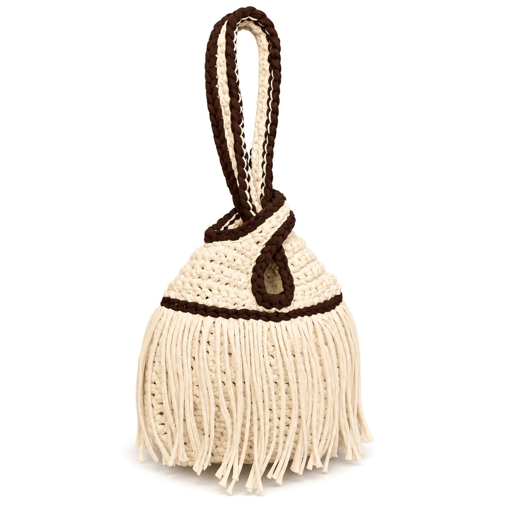 Handmade crochet mini swing bag in Magnolia cream with flowing fringe, Coconut Shell brown trim and a loop-through wristlet handle.
