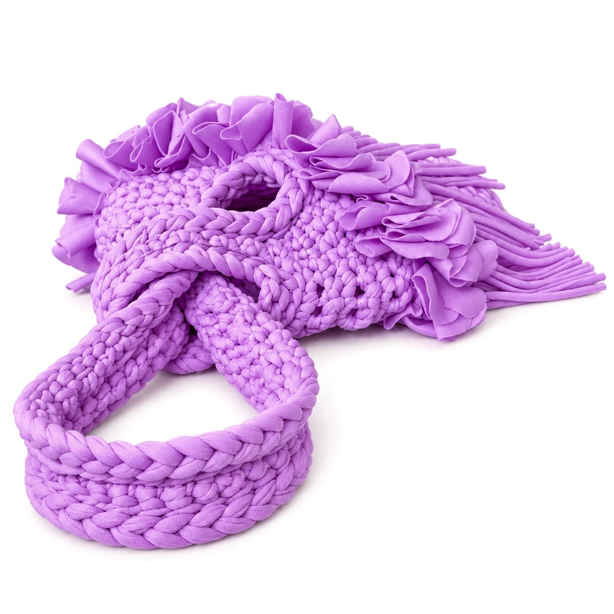 Handmade crochet mini swing bag in Orchid pink purple with flower fringe and a loop-through wristlet handle.