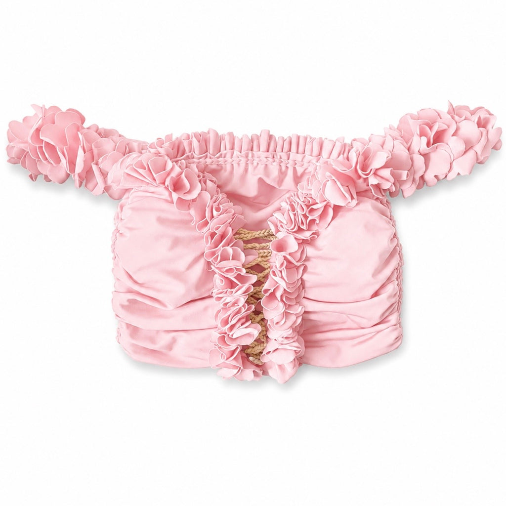 Petal pink floral off-the-shoulder crop top with flower lei trim and hand-crocheted lace-up center detail.