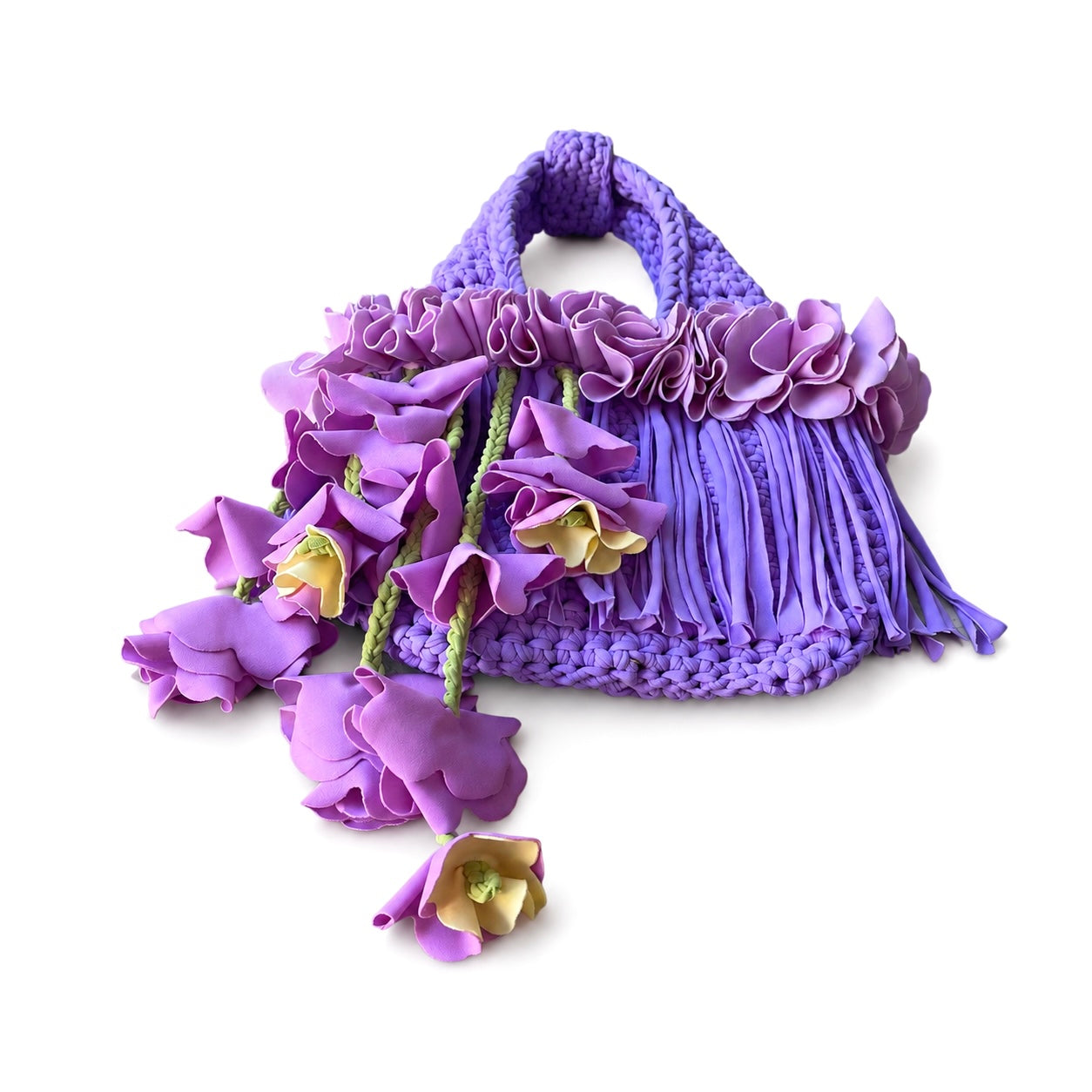Handmade lilac purple crochet whimsy mini bag with cascading floral fringe and braided orchid petal bells.